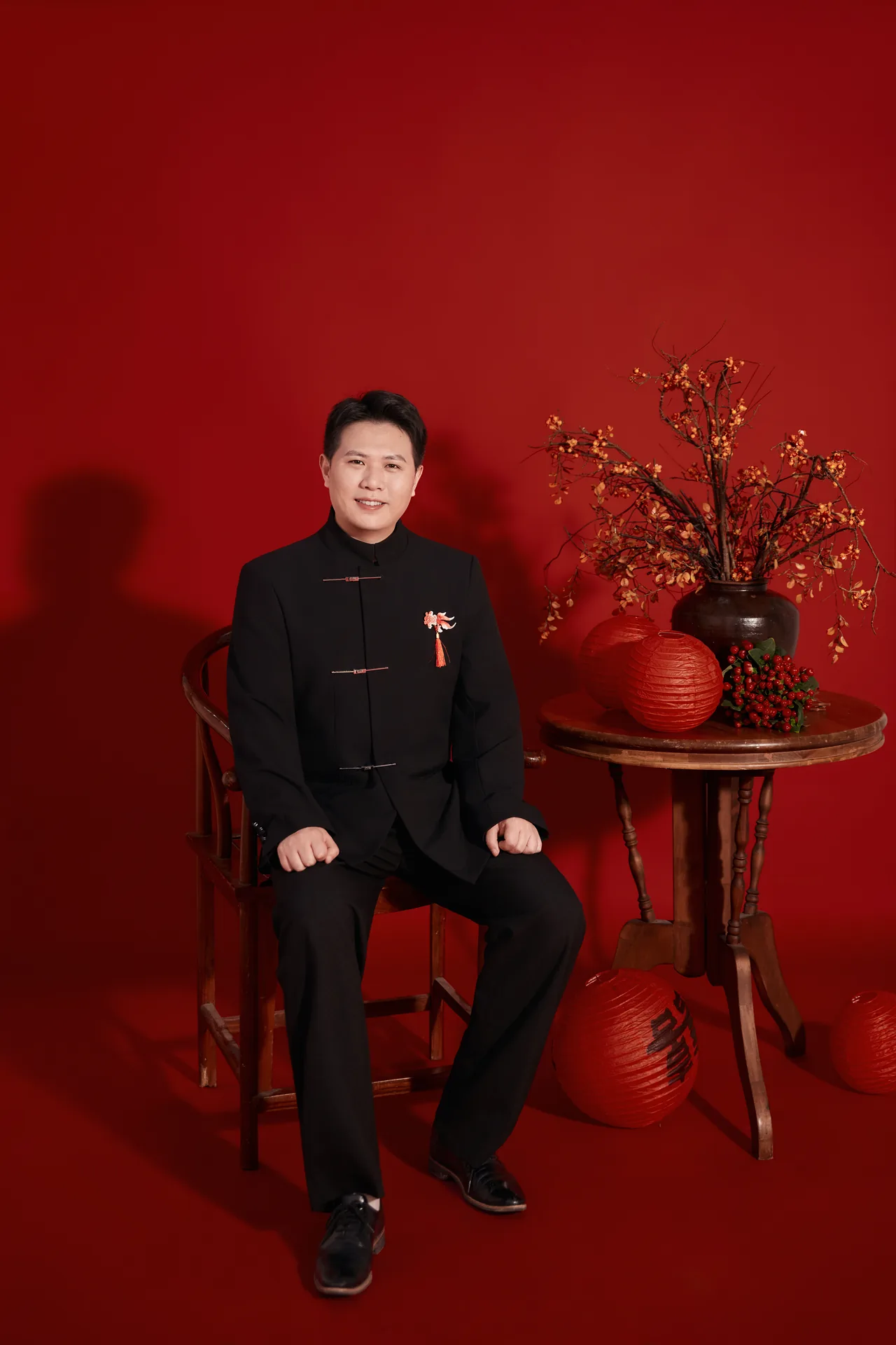 Groom portrait in traditional black attire